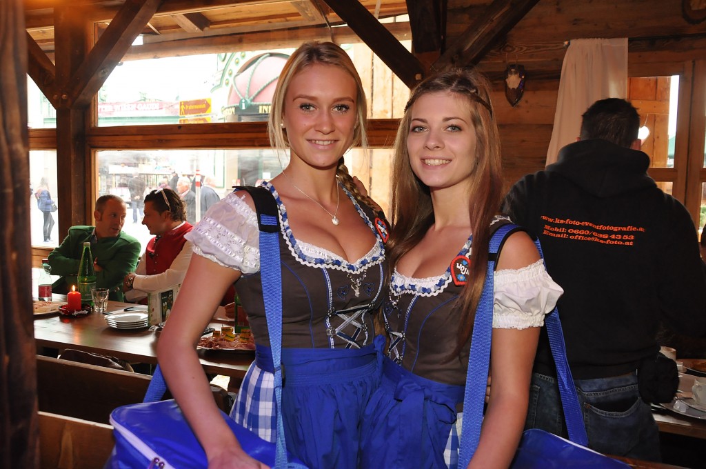 Two young ladies in traditional Austrian Dirndl pose during the Vienna Wiesn 2015 opening on September 24, 2015 in Vienna, Austria.