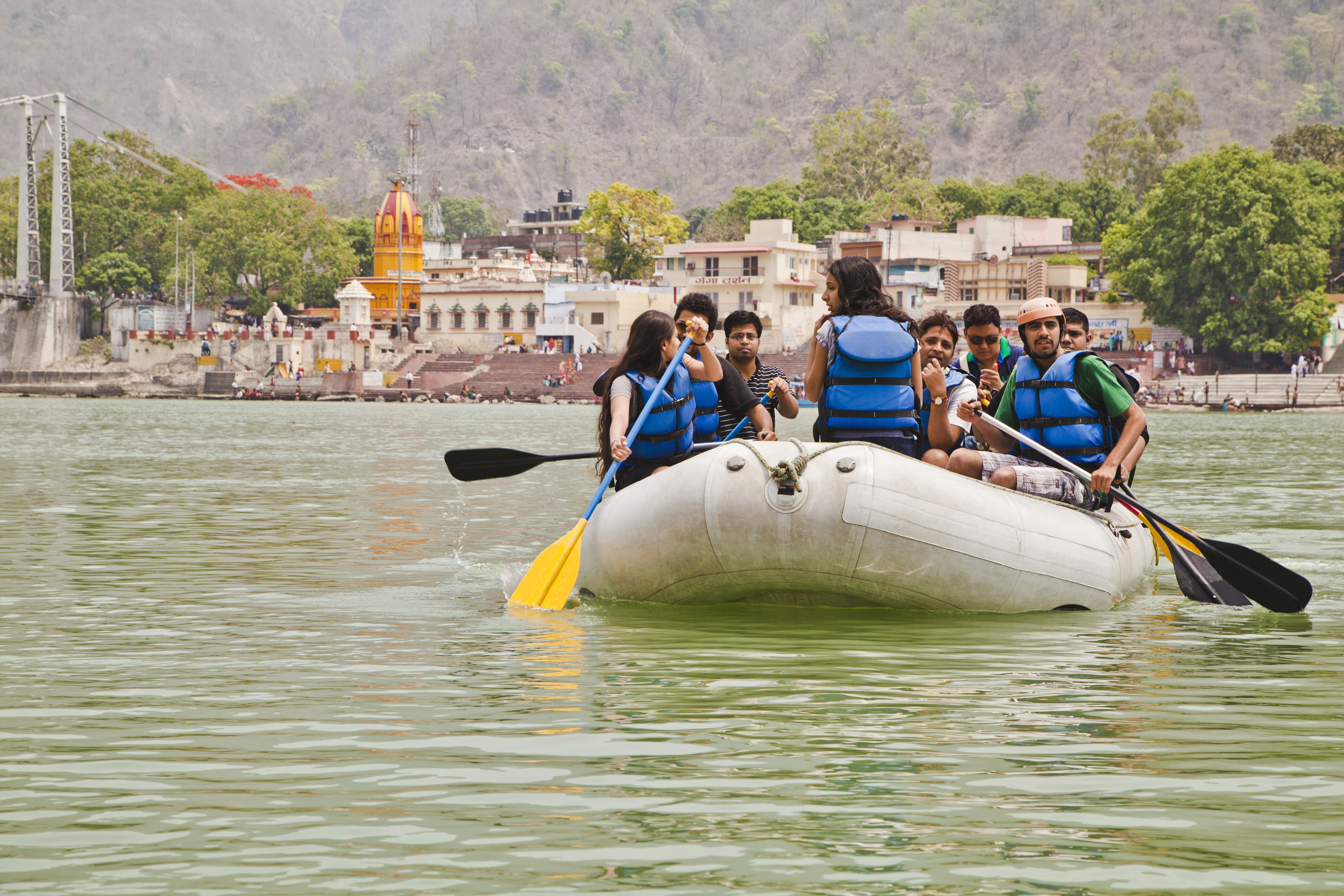 People rafting in Ganges River, Rishikesh, Uttarakhand, India. (Photo by: Exotica.im/UIG via Getty Images)