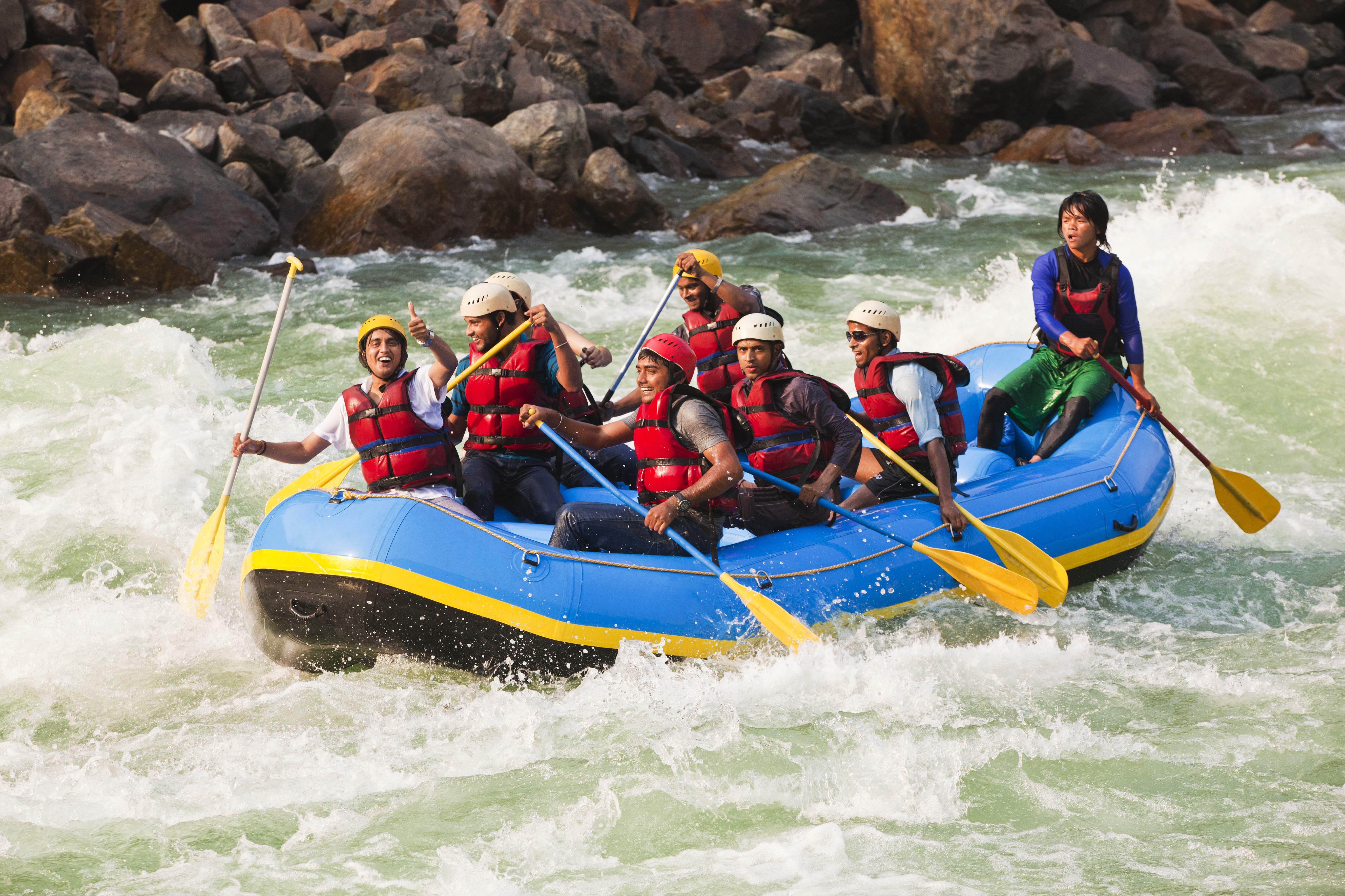 Group of people rafting in Ganges River, Rishikesh, Uttarakhand, India. (Photo by: Exotica.im/UIG via Getty Images)