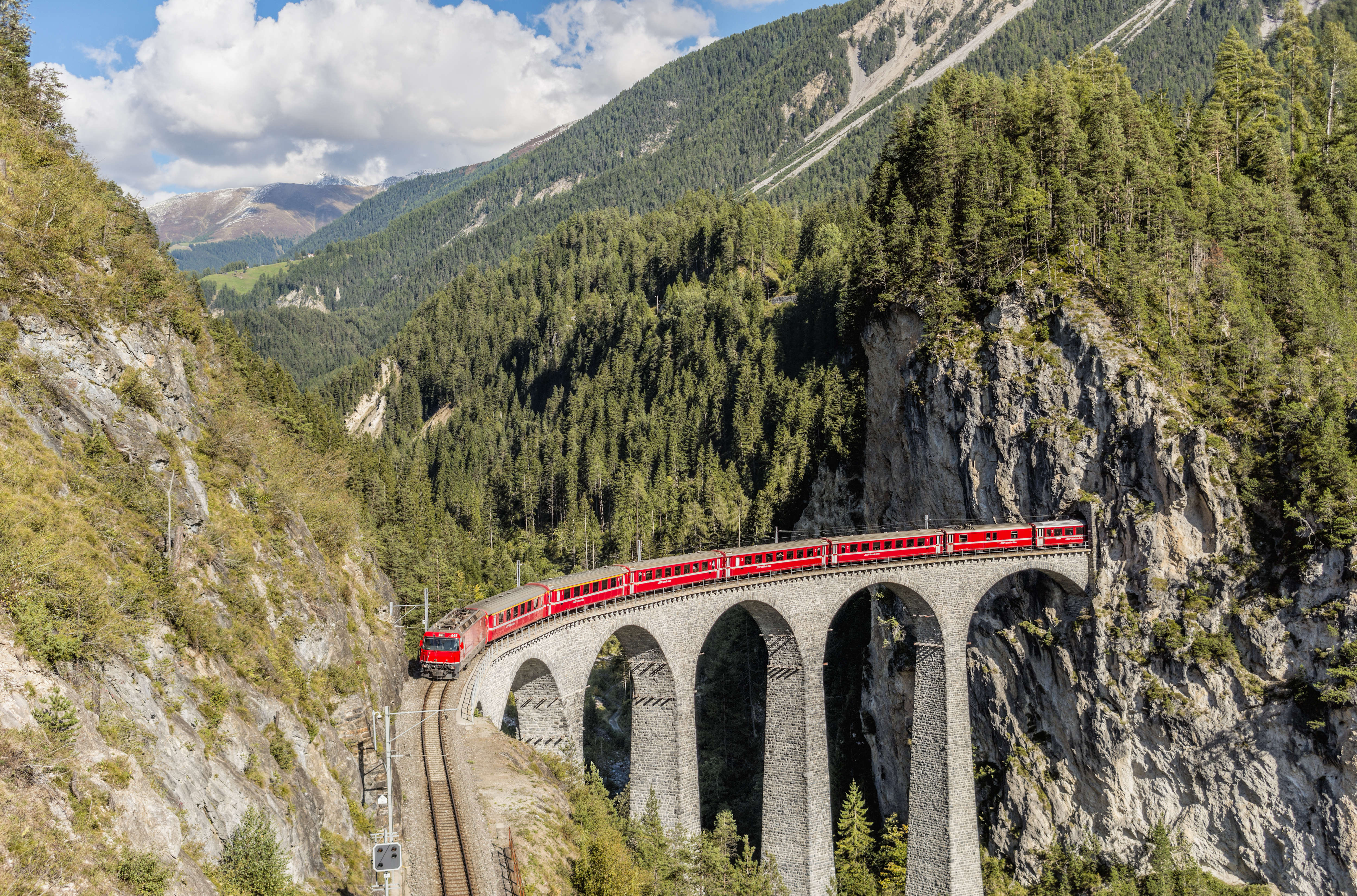GRISONS, SWITZERLAND - 2015/09/26: Express Train at Landwasser Viaduct at the Swiss Alps. (Photo by Olaf Protze/LightRocket via Getty Images)