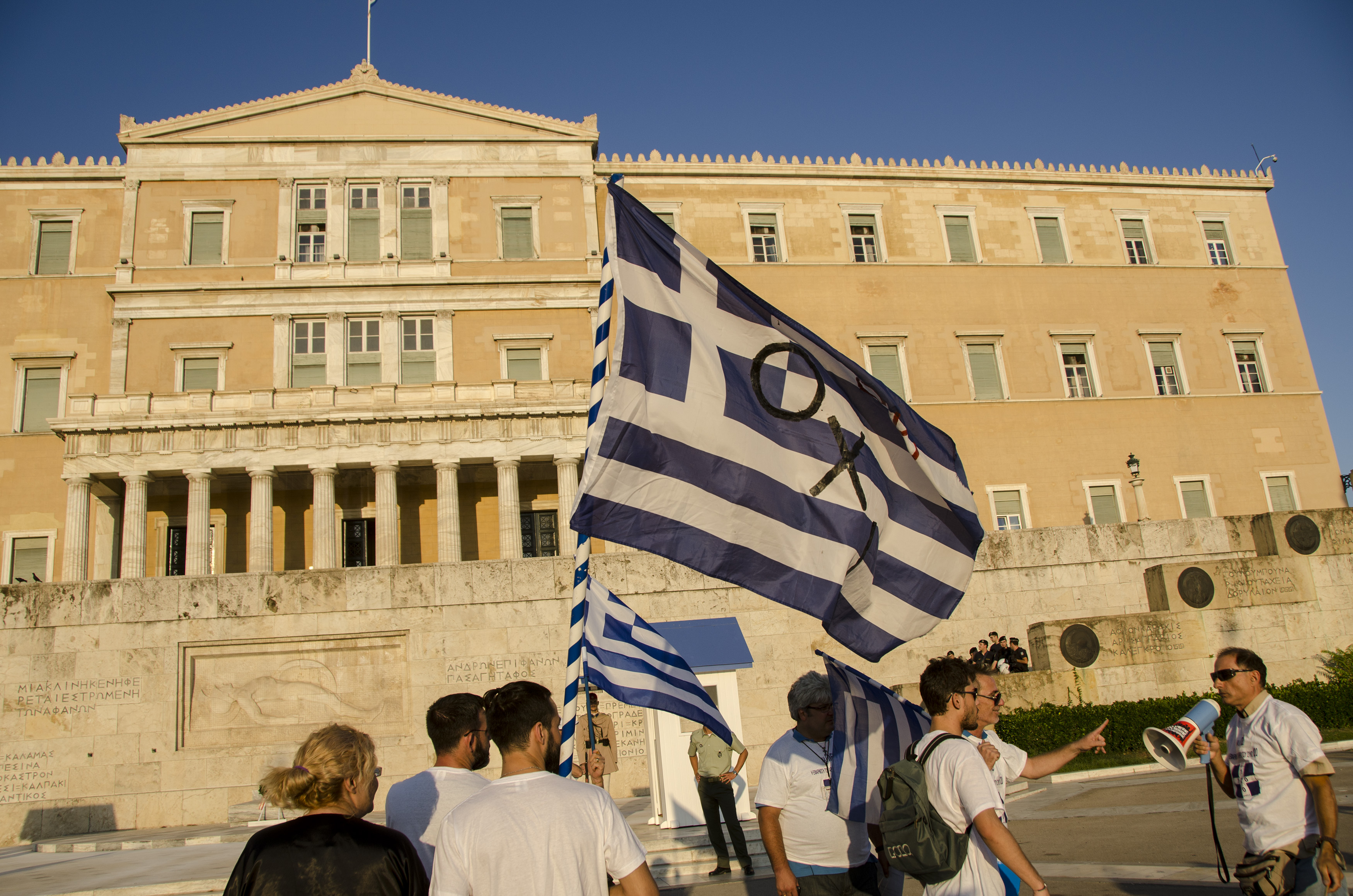 ATHENS, GREECE - 2016/07/05: Greek leftists demonstrate to commemorate the one year anniversary of the 5-July-2015 referendum when the people voted not to accept the bailout conditions and demanded that the government respect the 'no' decision. (Photo by George Panagakis/Pacific Press/LightRocket via Getty Images)