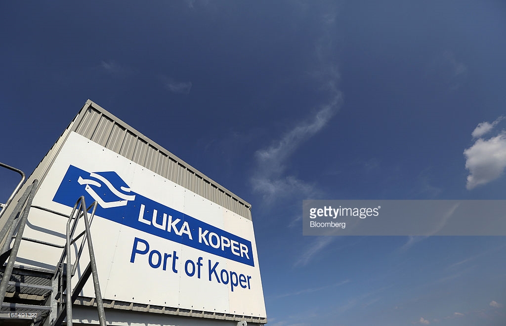 A logo sits on display on a structure at the port of Koper, operated by Luka Koper d.d., in Koper, Slovenia, on Thursday, May 9, 2013. The former Yugoslav nation, mired in its second recession since 2009, will contract this year and next, according to a May 3 report by the European Commission. Photographer: Chris Ratcliffe/Bloomberg